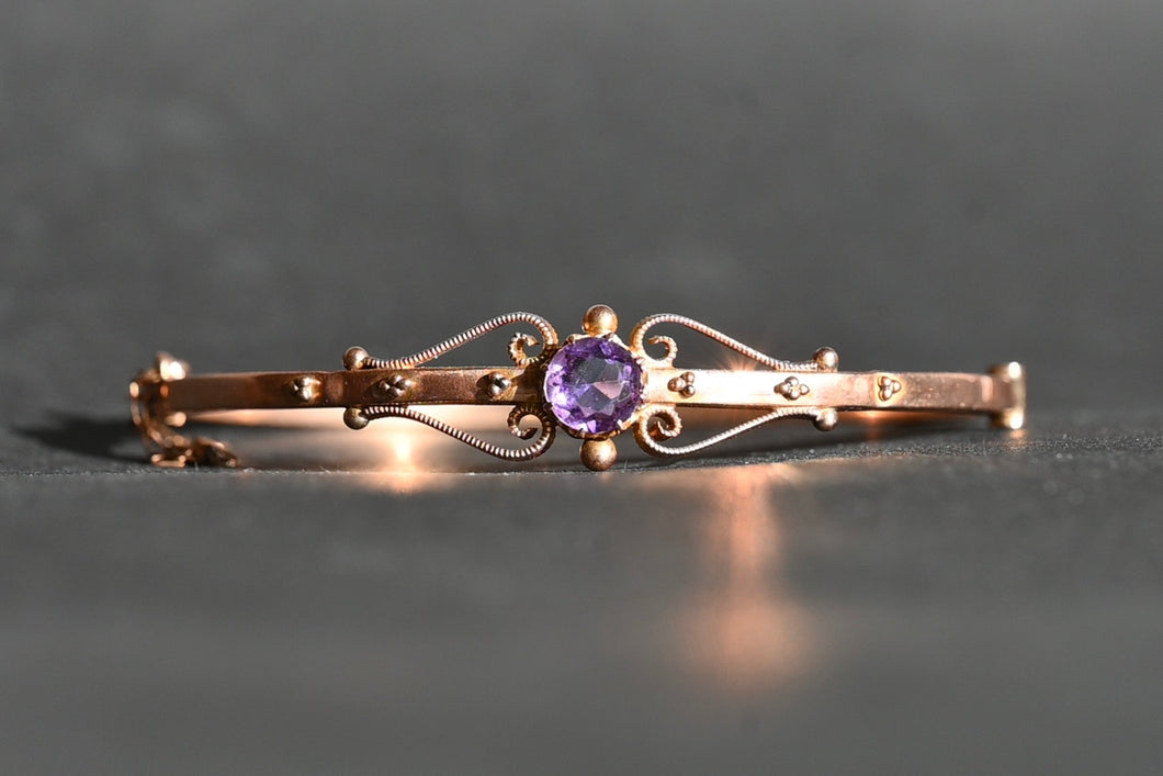 An Edwardian 9 Carat Rose Gold & Amethyst Hinged Bangle (1907)