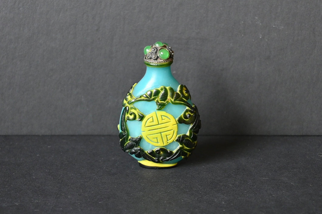 A Qing Peking Glass Shou, Bats, and Chilong Snuff Bottle